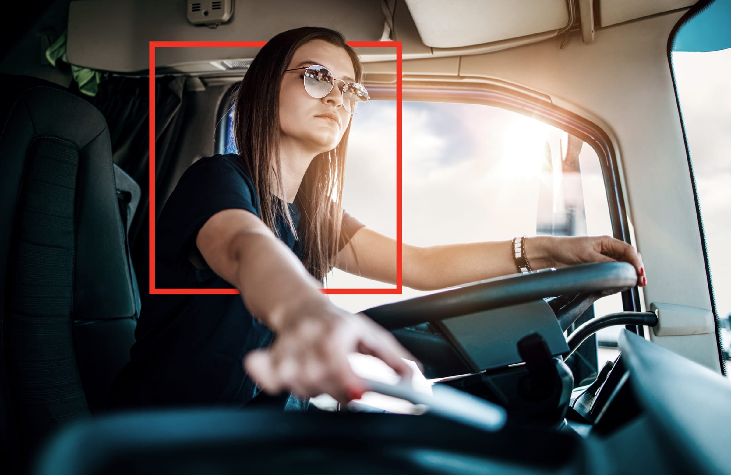 Woman driving a large truck